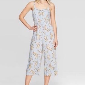 Xhilaration Floral Cropped Jumpsuit in Baby Blue. XS